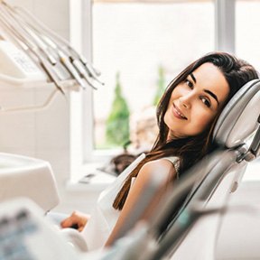 a patient resting while visiting her dentist