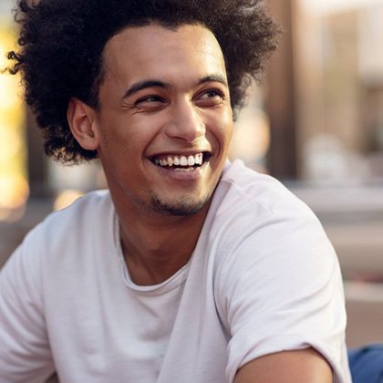 Young man smiling with beautifully maintained teeth